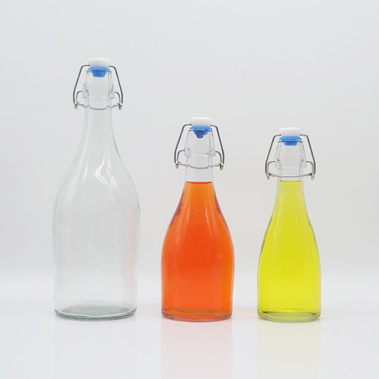 Custom Logo Empty Clear Drinking Beverage Beer Glass Bottles 1 Liter With Swing Top Lid