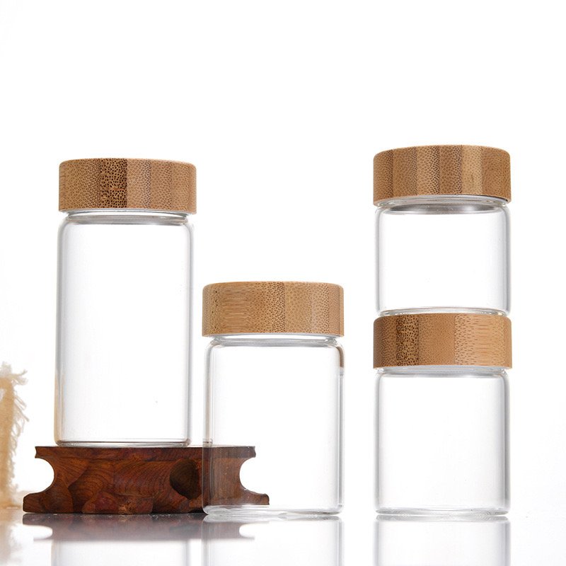 Wholesale Empty Small Glass Bottle 10ml 20ml 30ml 50ml Borosilicate Clear Tube Bottle Glass Bamboo Screw Cap Glass Bottle