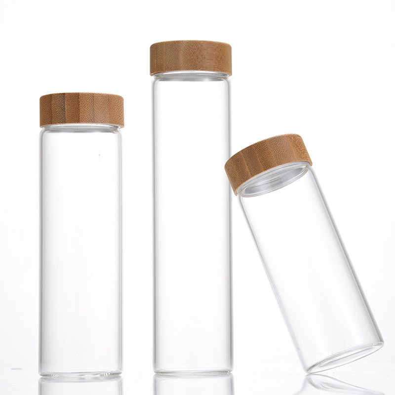 Wholesale Empty Small Glass Bottle 10ml 20ml 30ml 50ml Borosilicate Clear Tube Bottle Glass Bamboo Screw Cap Glass Bottle