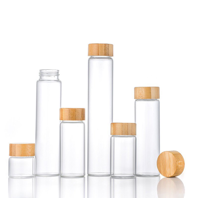 Wholesale Empty Small Glass Bottle 10ml 20ml 30ml 50ml Borosilicate Clear Tube Bottle Glass Bamboo Screw Cap Glass Bottle