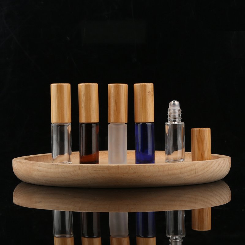 Hot Sale 10ml Amber Roll On Bottle Bamboo Cap Essential Oils Roller Ball Glass Bottle Clear Glass Roller Bottle