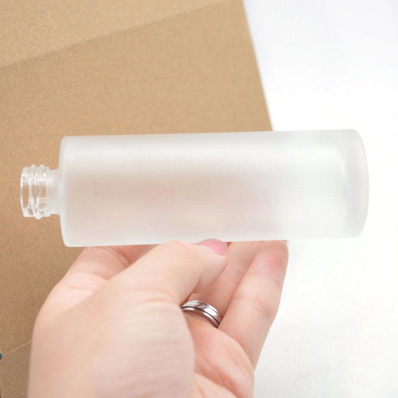 Eco friendly frosted glass lotion sprayer bottle with pump spray 50ml 100ml