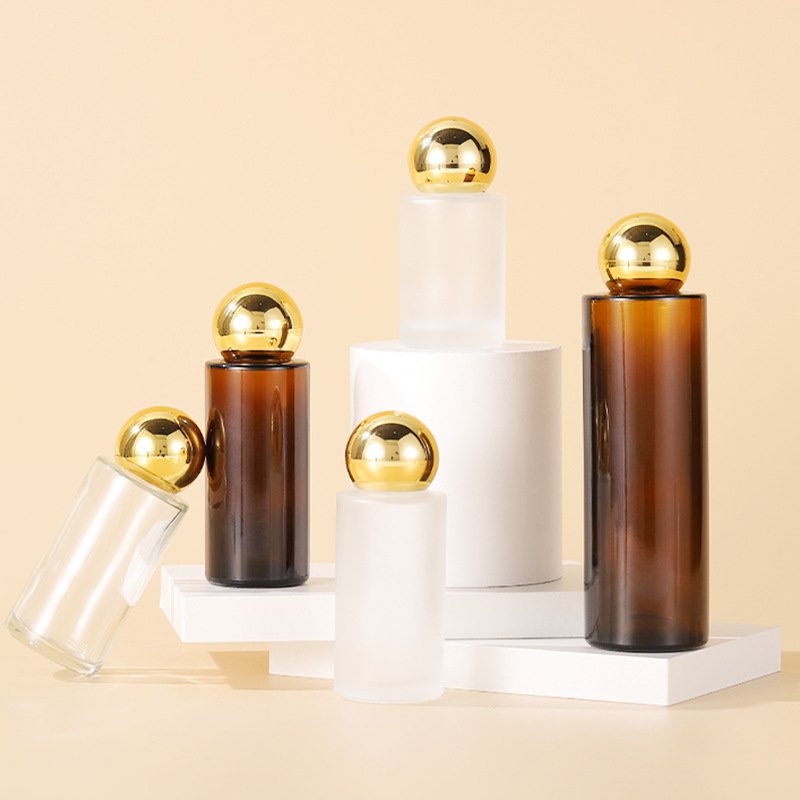 New style Spot goods 20-150ml amber flat shoulder transparent matte Makeup Remover Water Spherical lid toner glass bottle