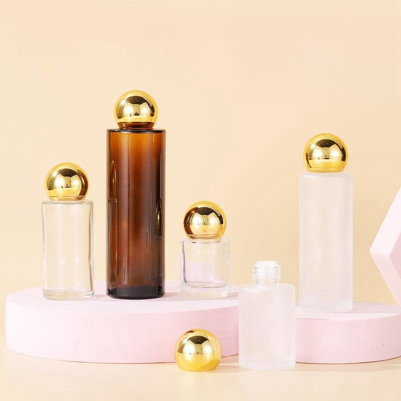 New style Spot goods 20-150ml amber flat shoulder transparent matte Makeup Remover Water Spherical lid toner glass bottle
