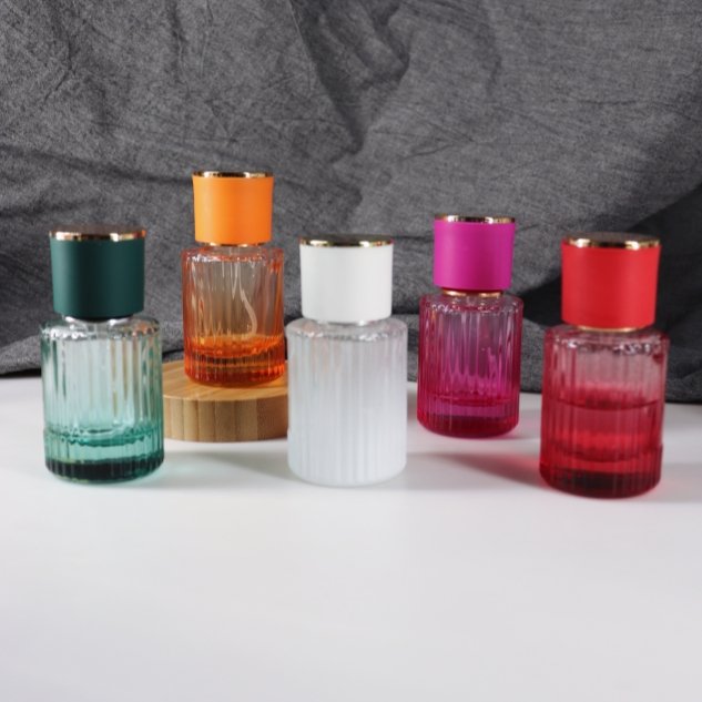 High Quality Wholesale Fashion Perfume Bottle 50ml Transparent Custom Color Perfume Glass Bottles with custom logo