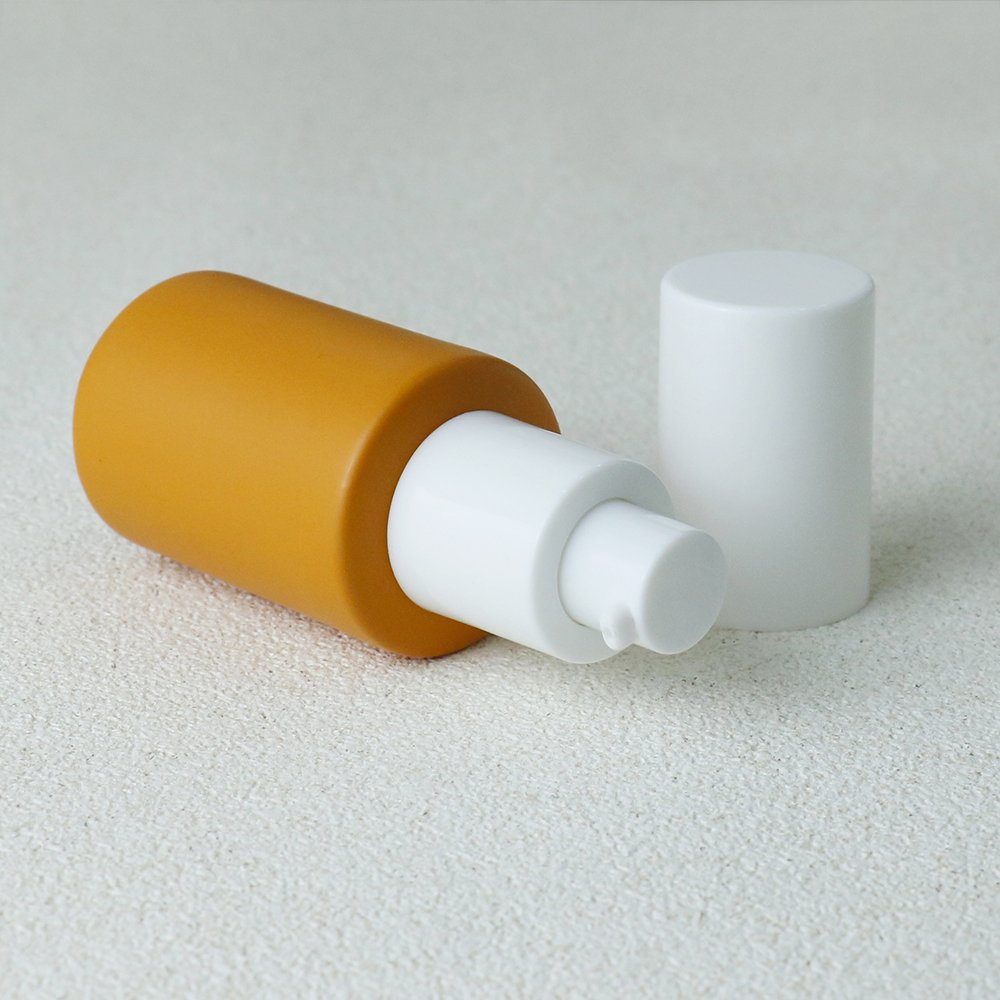 The essential oil glass bottle with dropper or plastic pump empty 30 ml 15 ml 60 ml 100 ml round essential oil bottle