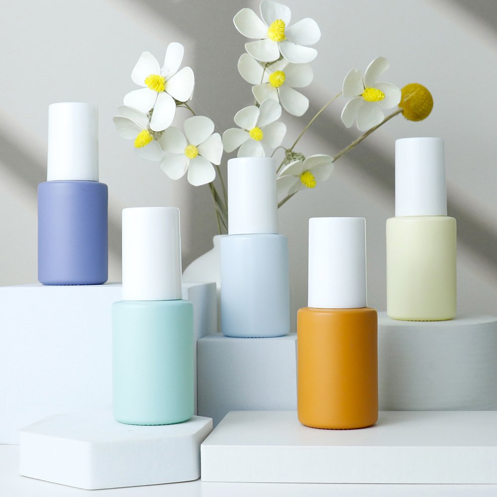 The essential oil glass bottle with dropper or plastic pump empty 30 ml 15 ml 60 ml 100 ml round essential oil bottle