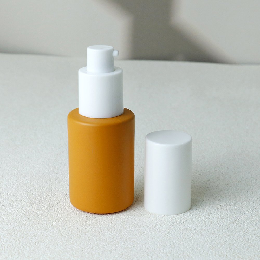 The essential oil glass bottle with dropper or plastic pump empty 30 ml 15 ml 60 ml 100 ml round essential oil bottle