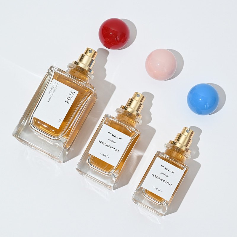 Luxury 30ml 50ml 100ml Clear Empty Square Luxury Spray Crimp Perfume Bottles Glass Bottle With Red Blue Pink Plastic Ball cap