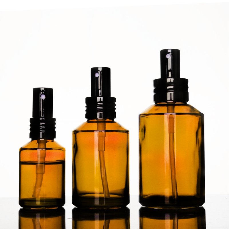 China Manufacturer luxury 50ml 125ml flat shoulder empty glass perfume bottles with mist spray and black lid