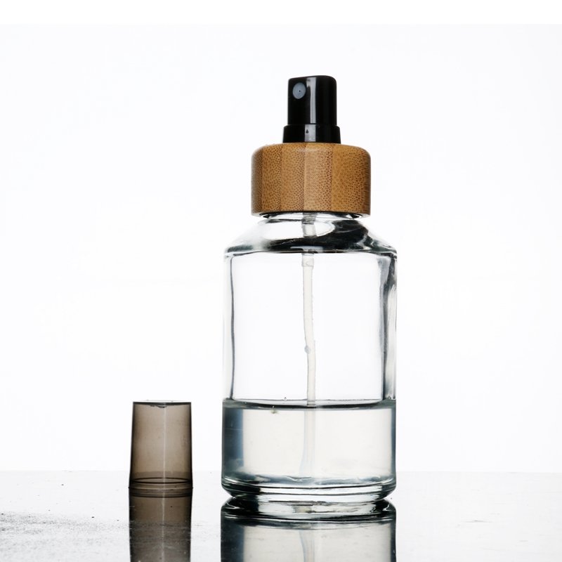 China Manufacturer luxury 50ml 125ml flat shoulder empty glass perfume bottles with mist spray and black lid