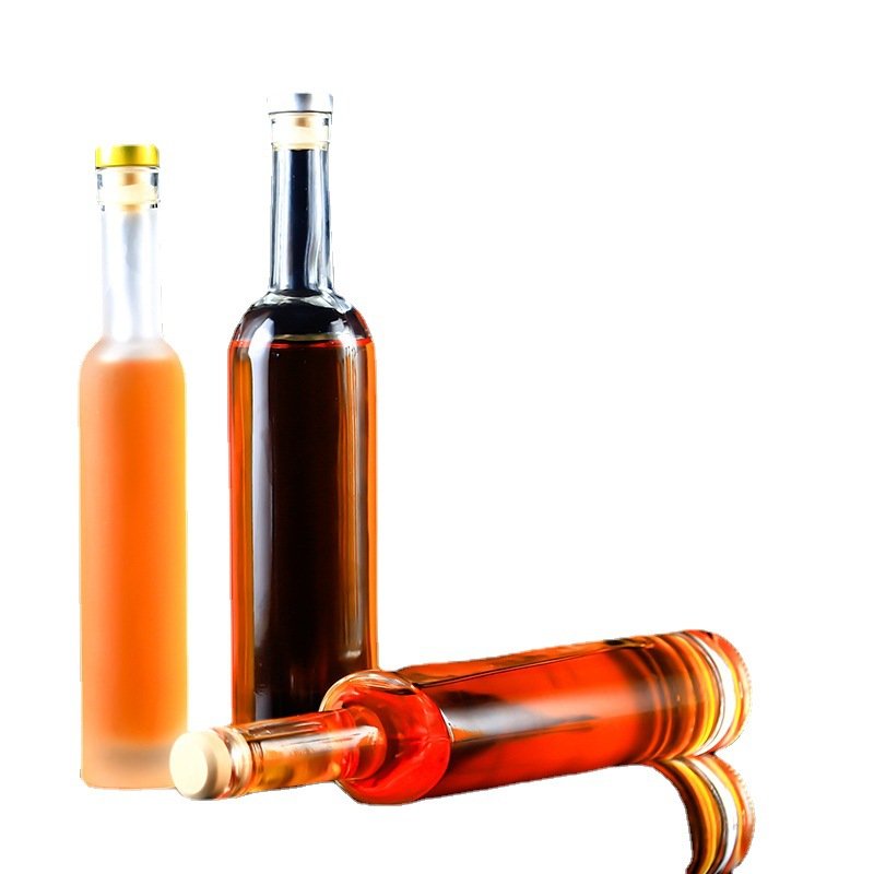 Best selling price empty glass bottles with lids water glass bottles for juice