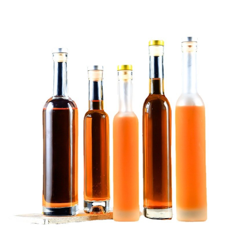 Best selling price empty glass bottles with lids water glass bottles for juice
