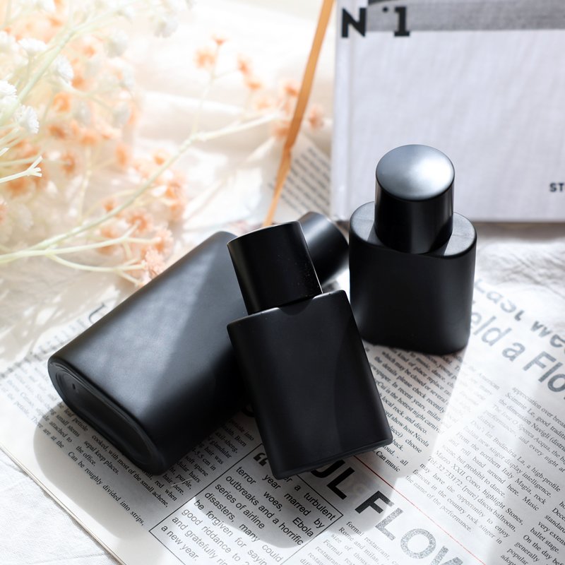 High Quality Matt Black Perfume Glass Bottle Round Cap 30ml Capacity Cosmetics Packaging 50ml 100ml Cover Styles Available