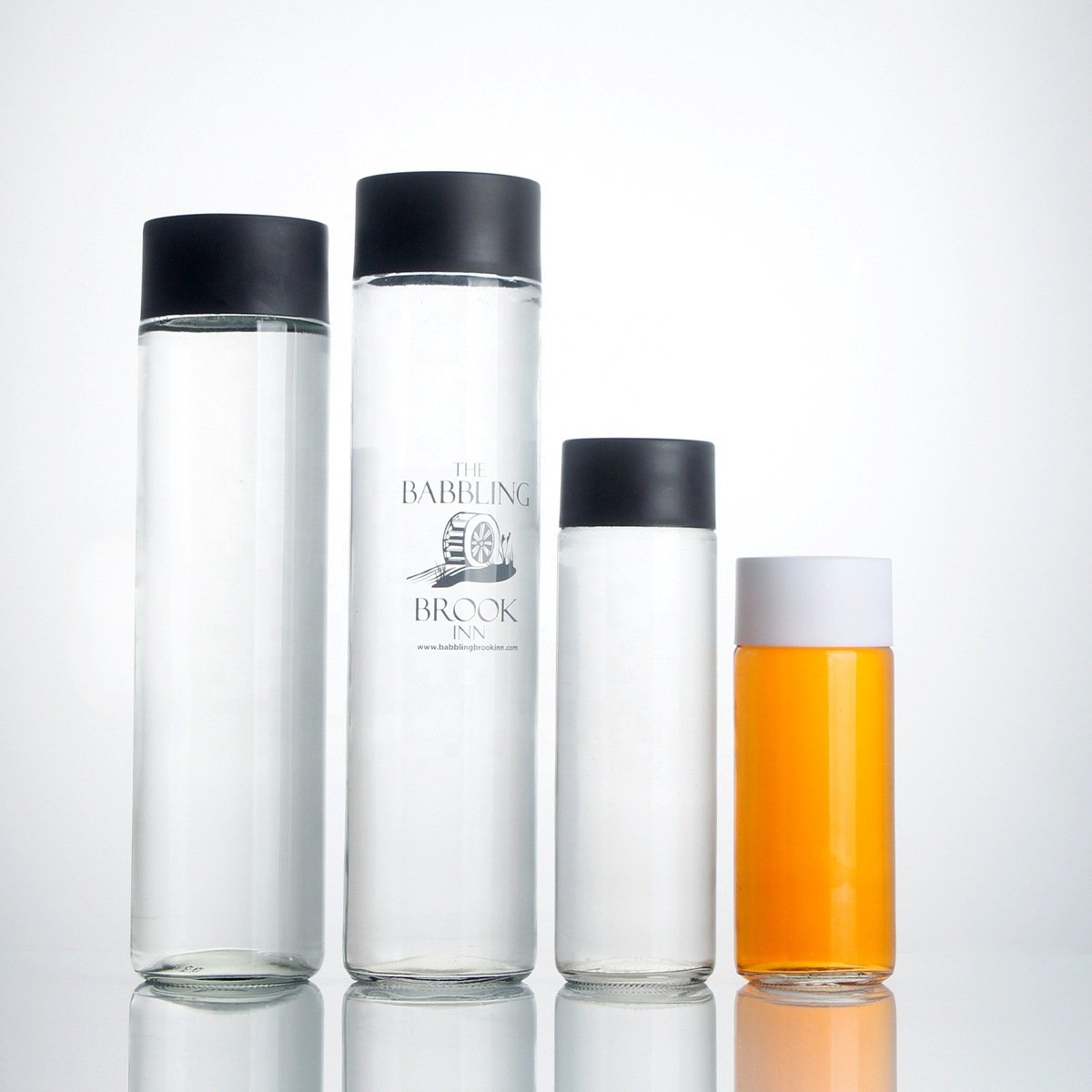 botella de agua de vidrioClear Mineral Water Juice Beverage Glass Bottle Custom Logo Print Glass Drinking Water Bottle with Cap