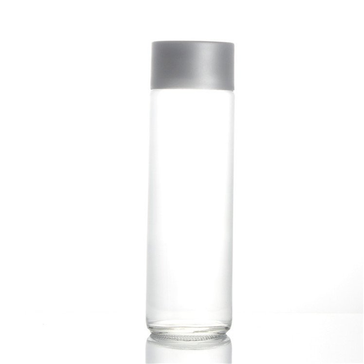 botella de agua de vidrioClear Mineral Water Juice Beverage Glass Bottle Custom Logo Print Glass Drinking Water Bottle with Cap