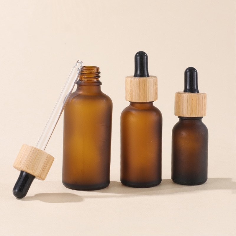 Factory direct bamboo essential oil bottle frosted amber dropper glass bottle with bamboo cap