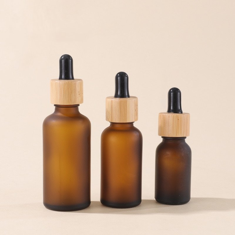 Factory direct bamboo essential oil bottle frosted amber dropper glass bottle with bamboo cap