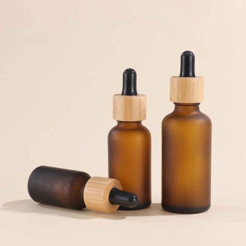 Factory direct bamboo essential oil bottle frosted amber dropper glass bottle with bamboo cap