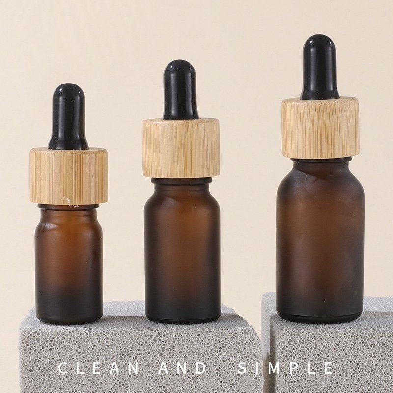 Factory direct bamboo essential oil bottle frosted amber dropper glass bottle with bamboo cap
