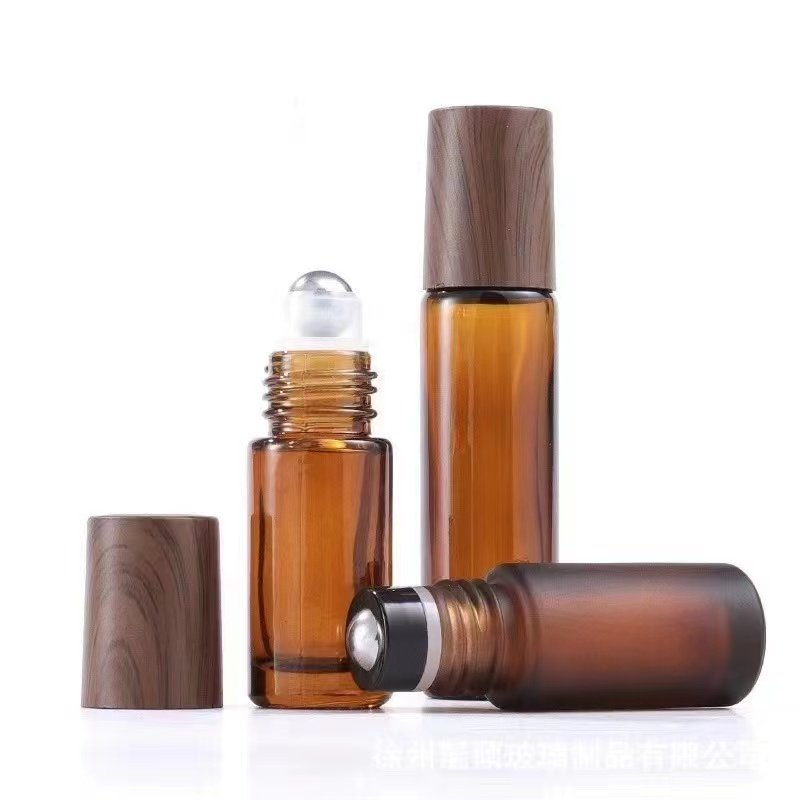 China Hot sale customized Empty 5ml 10ml 15ml Roller Bottles Amber Clear Frosted Roll On Glass Bottle for essential oil