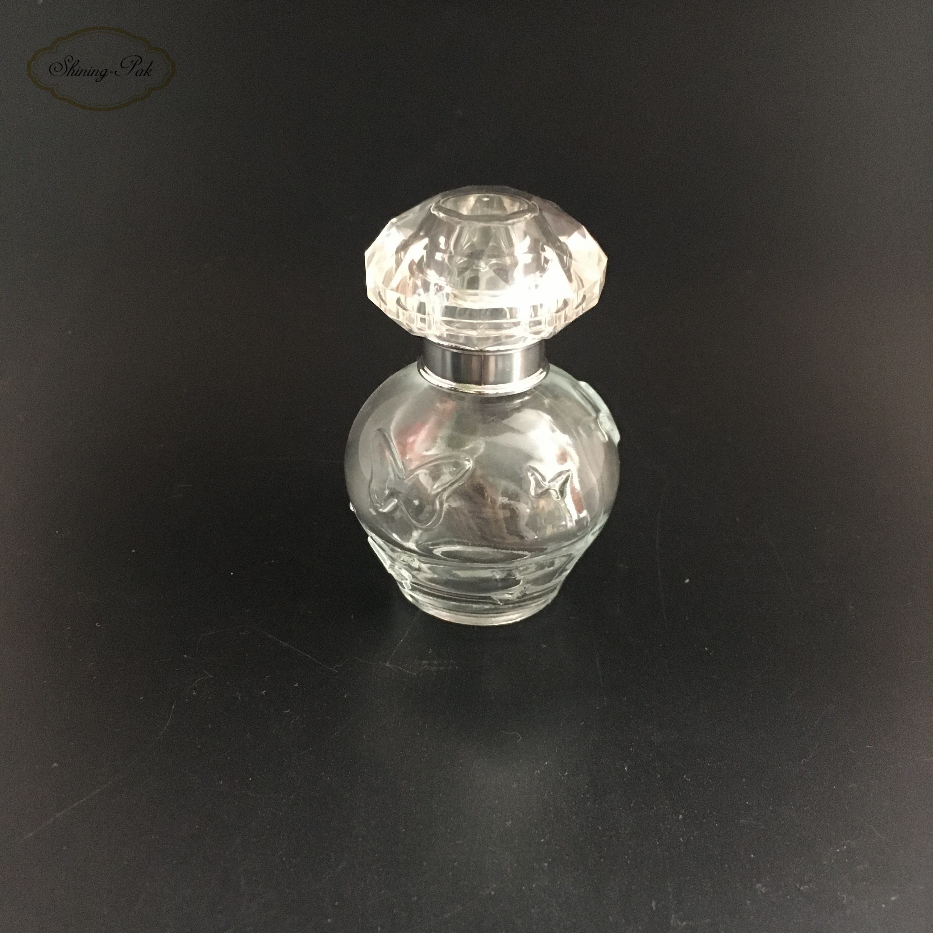 Wholesale New Design Quality 30ml Round Clear Unique Empty Perfume Glass Bottle