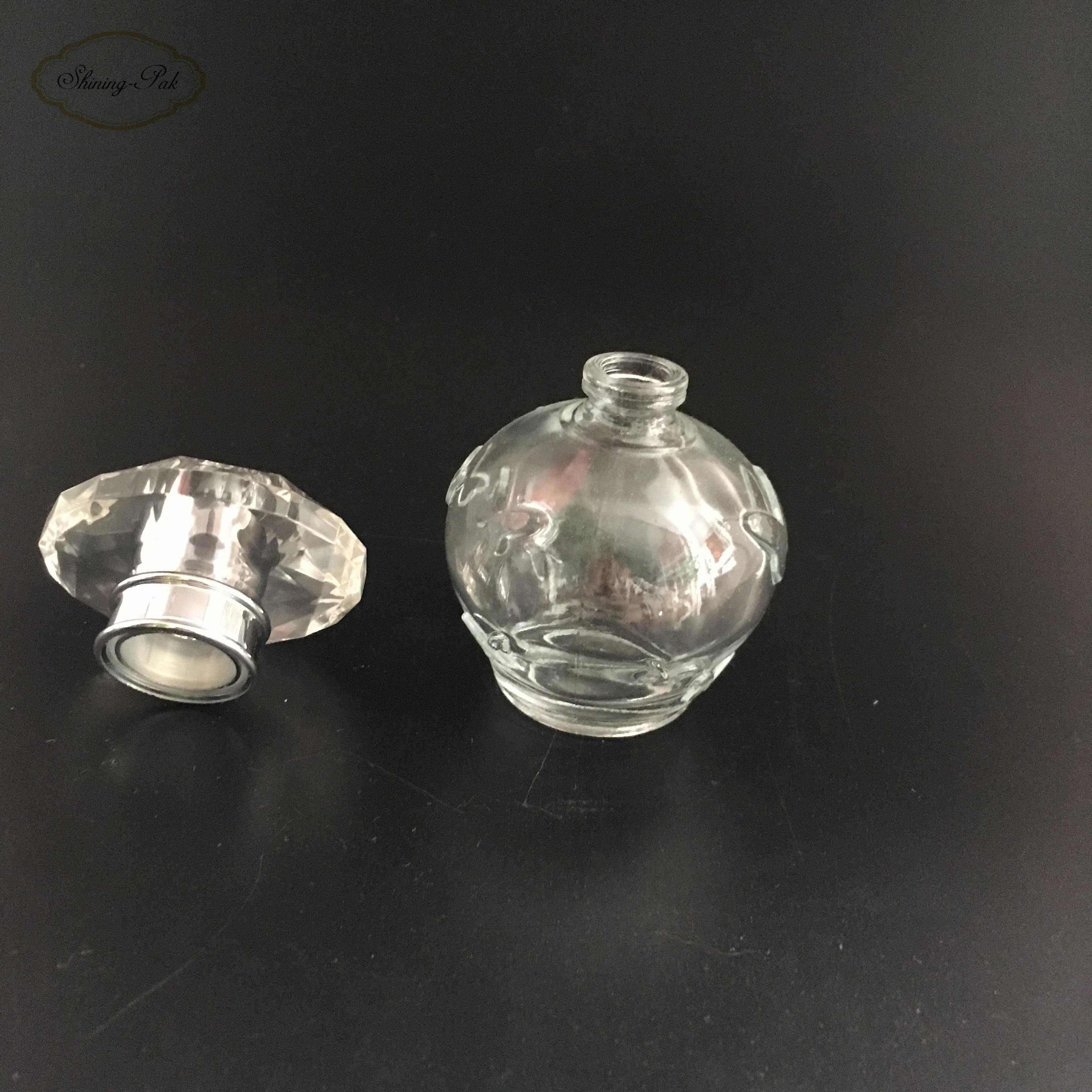 Wholesale New Design Quality 30ml Round Clear Unique Empty Perfume Glass Bottle