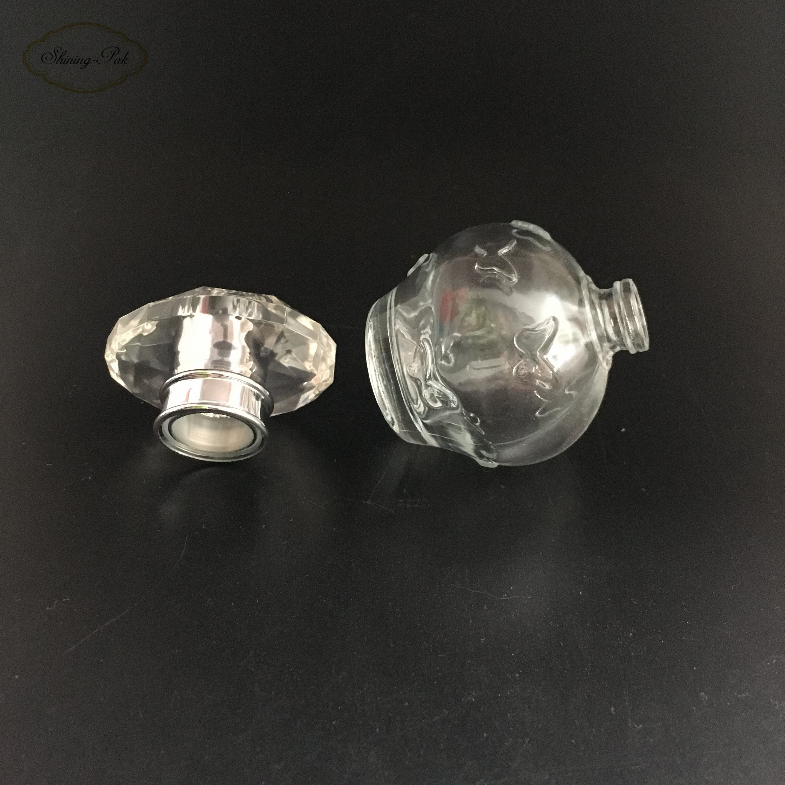 Wholesale New Design Quality 30ml Round Clear Unique Empty Perfume Glass Bottle