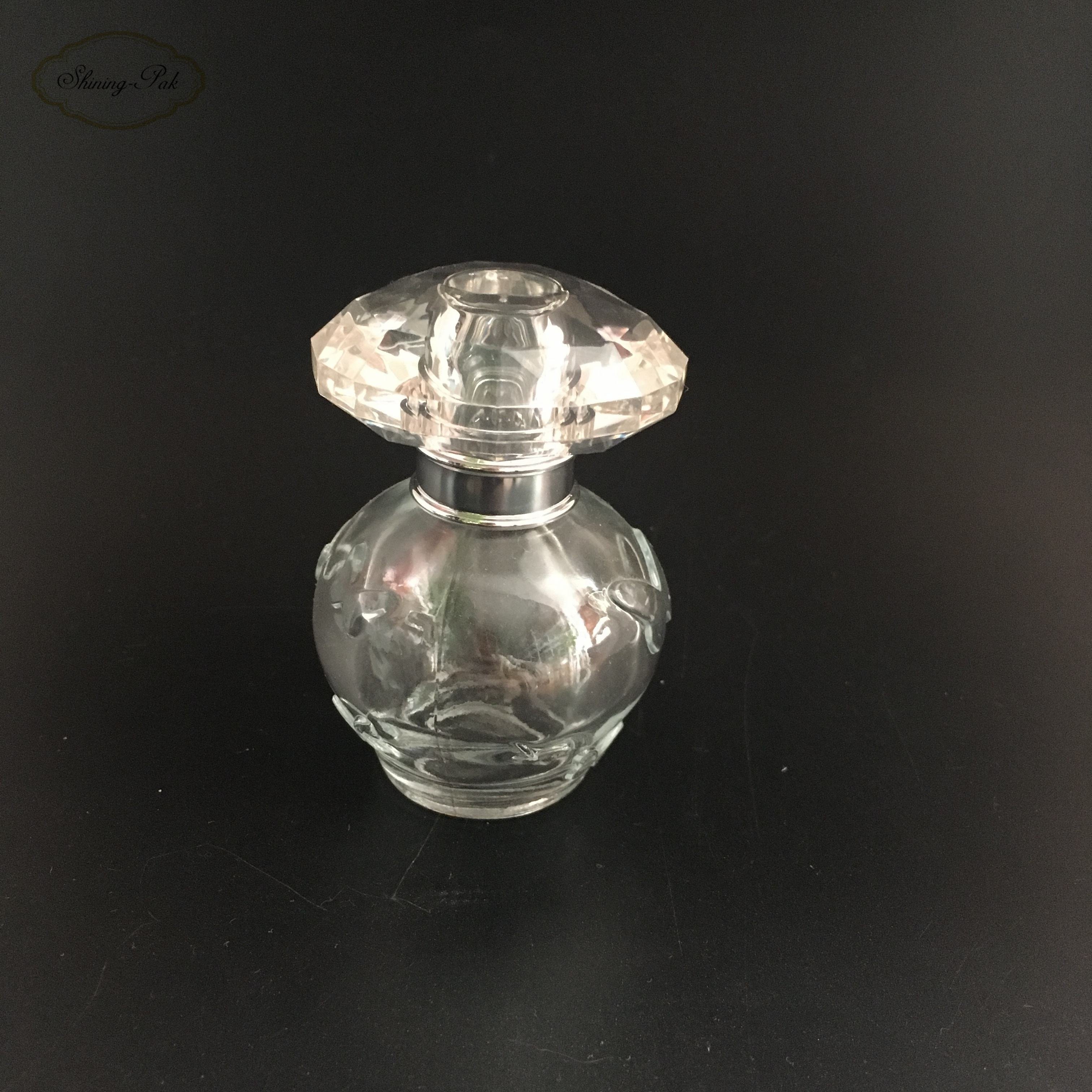 Wholesale New Design Quality 30ml Round Clear Unique Empty Perfume Glass Bottle