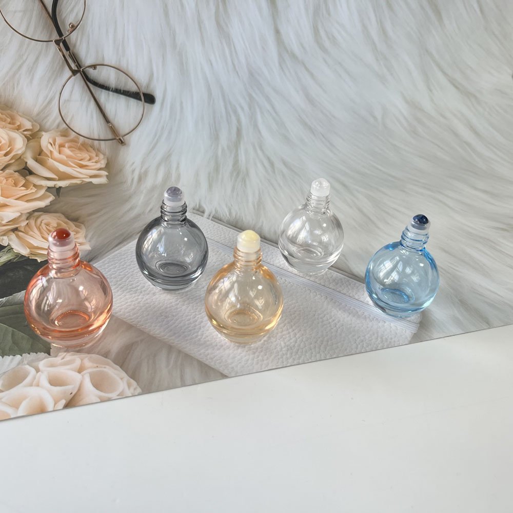 Wholesale 10ml bulb shape pink grey clear blue orange color natural stone gemstone roller essential oil glass bottles