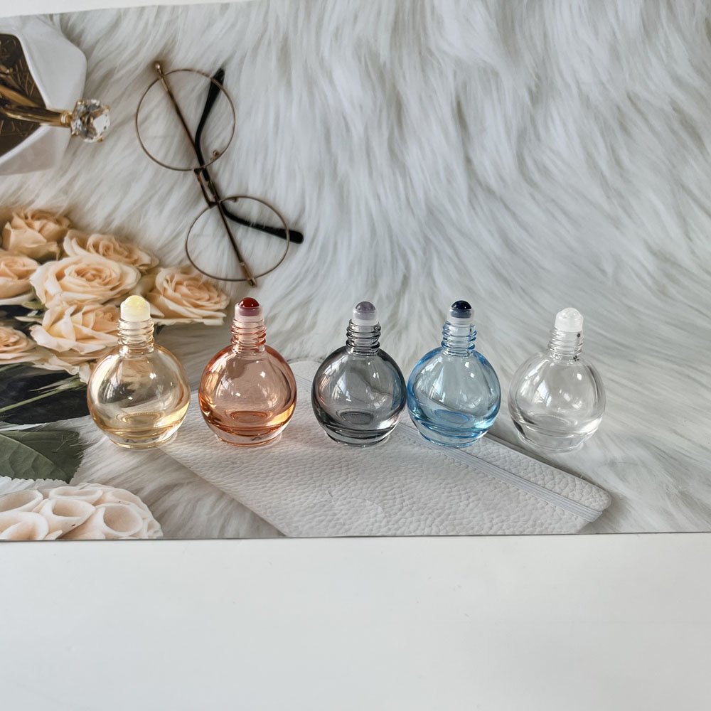 Wholesale 10ml bulb shape pink grey clear blue orange color natural stone gemstone roller essential oil glass bottles