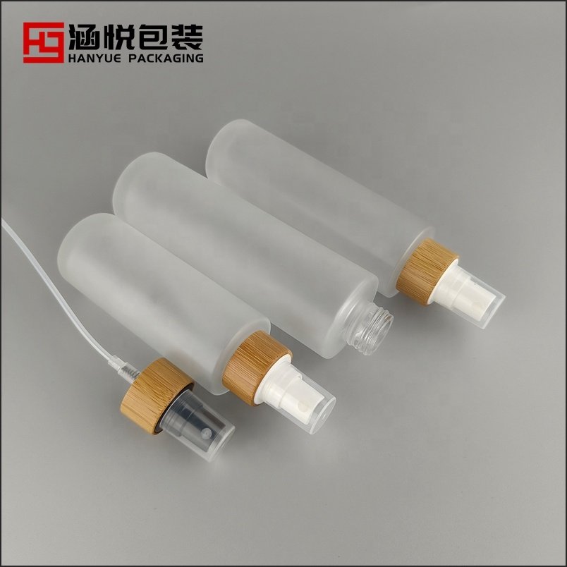 Flat shoulder glass bottle 100 ml 120 ml 150 ml cosmetic sprayer frosted glass bottle with bamboo spray pump