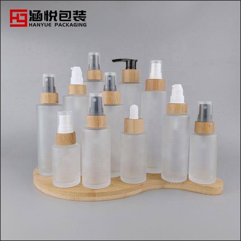 Flat shoulder glass bottle 100 ml 120 ml 150 ml cosmetic sprayer frosted glass bottle with bamboo spray pump
