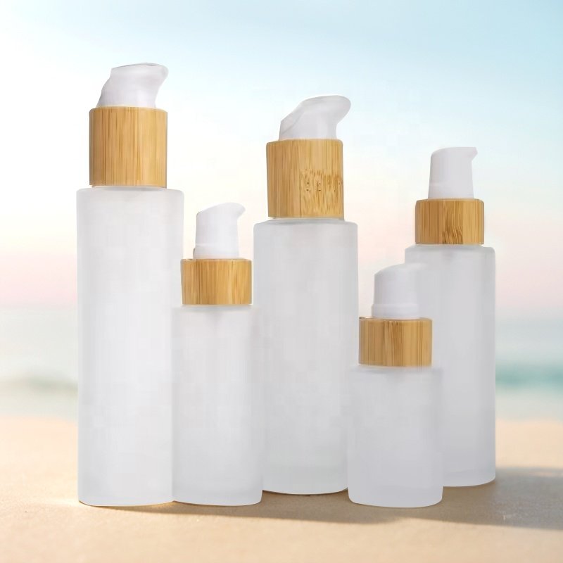 New Developed frosted Wooden Bamboo Cap Round Transparent 30ml 50ml 60ml 100/120/150/200ml Glass Bottle With Lotion Pump