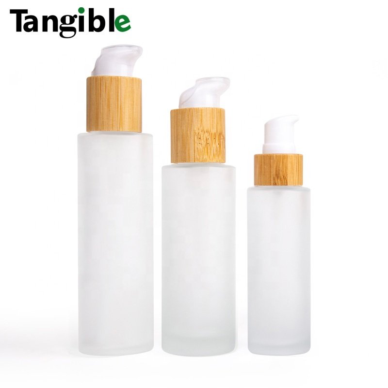 New Developed frosted Wooden Bamboo Cap Round Transparent 30ml 50ml 60ml 100/120/150/200ml Glass Bottle With Lotion Pump