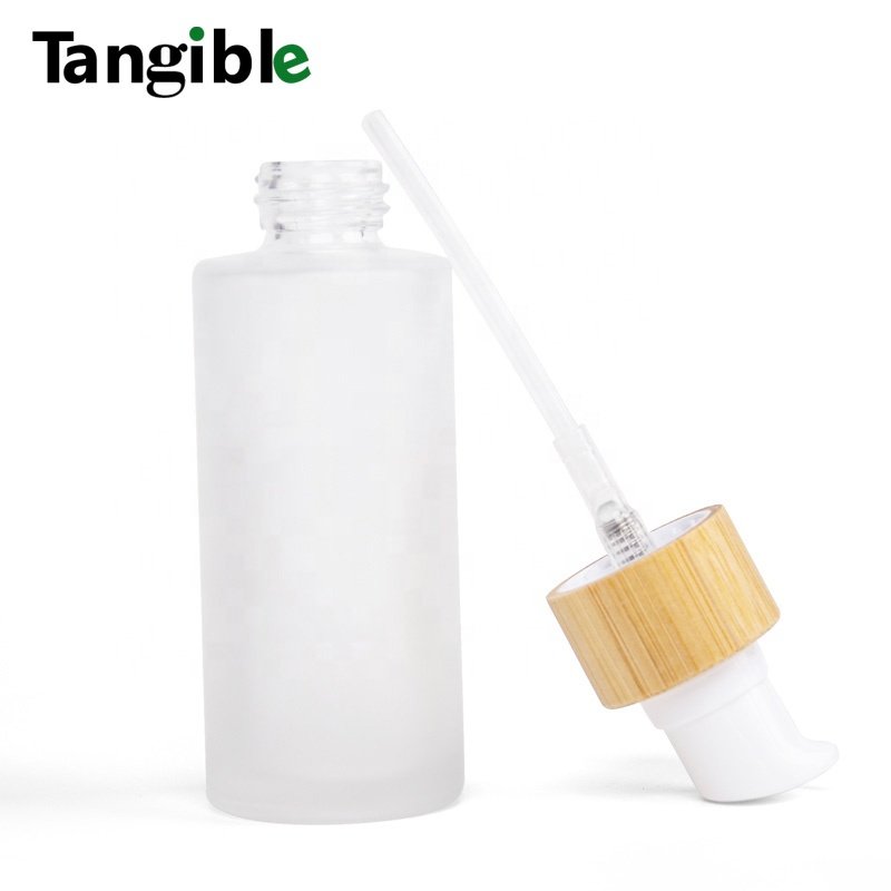 New Developed frosted Wooden Bamboo Cap Round Transparent 30ml 50ml 60ml 100/120/150/200ml Glass Bottle With Lotion Pump