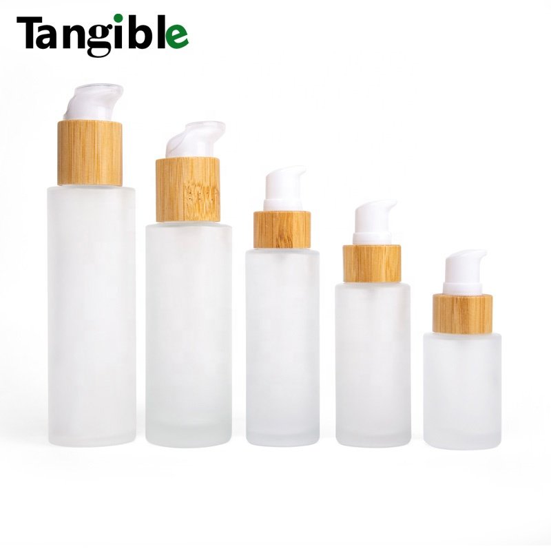 New Developed frosted Wooden Bamboo Cap Round Transparent 30ml 50ml 60ml 100/120/150/200ml Glass Bottle With Lotion Pump