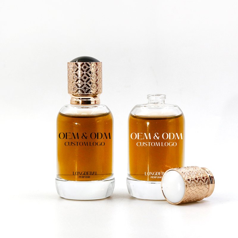 Wholesale clear perfume glass bottle 50ml 100ml spray bottle crimp empty round perfume bottle with Gold cap