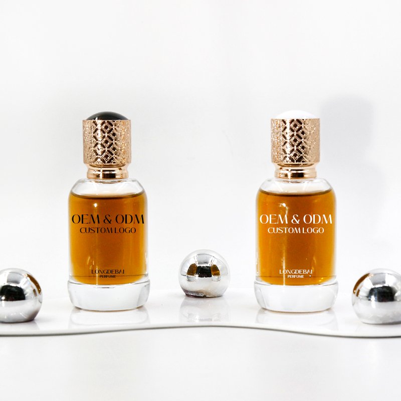 Wholesale clear perfume glass bottle 50ml 100ml spray bottle crimp empty round perfume bottle with Gold cap