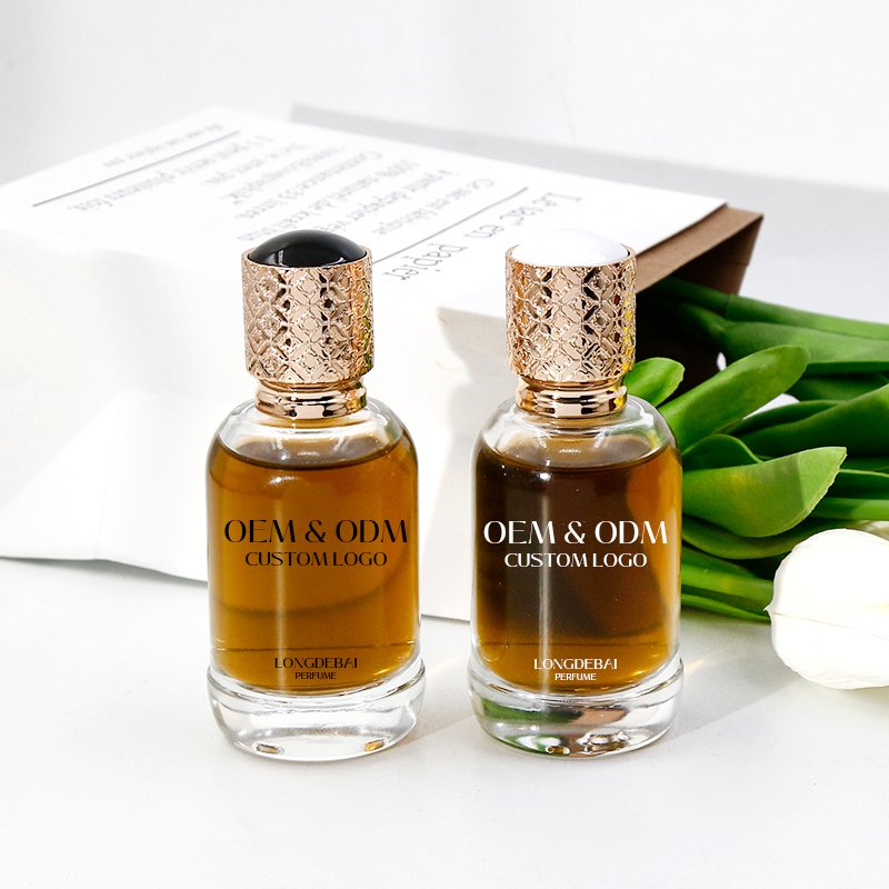 Wholesale clear perfume glass bottle 50ml 100ml spray bottle crimp empty round perfume bottle with Gold cap