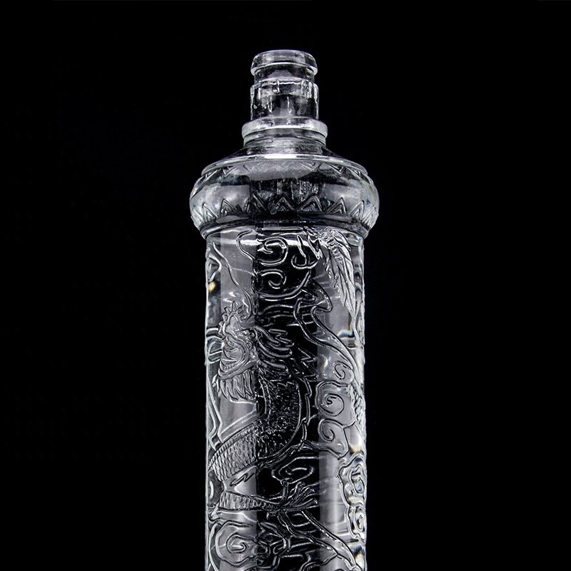 New Fancy Custom Glass Bottle Beautiful Dragon Embossed Liquor Glass Bottle With Golden Lid