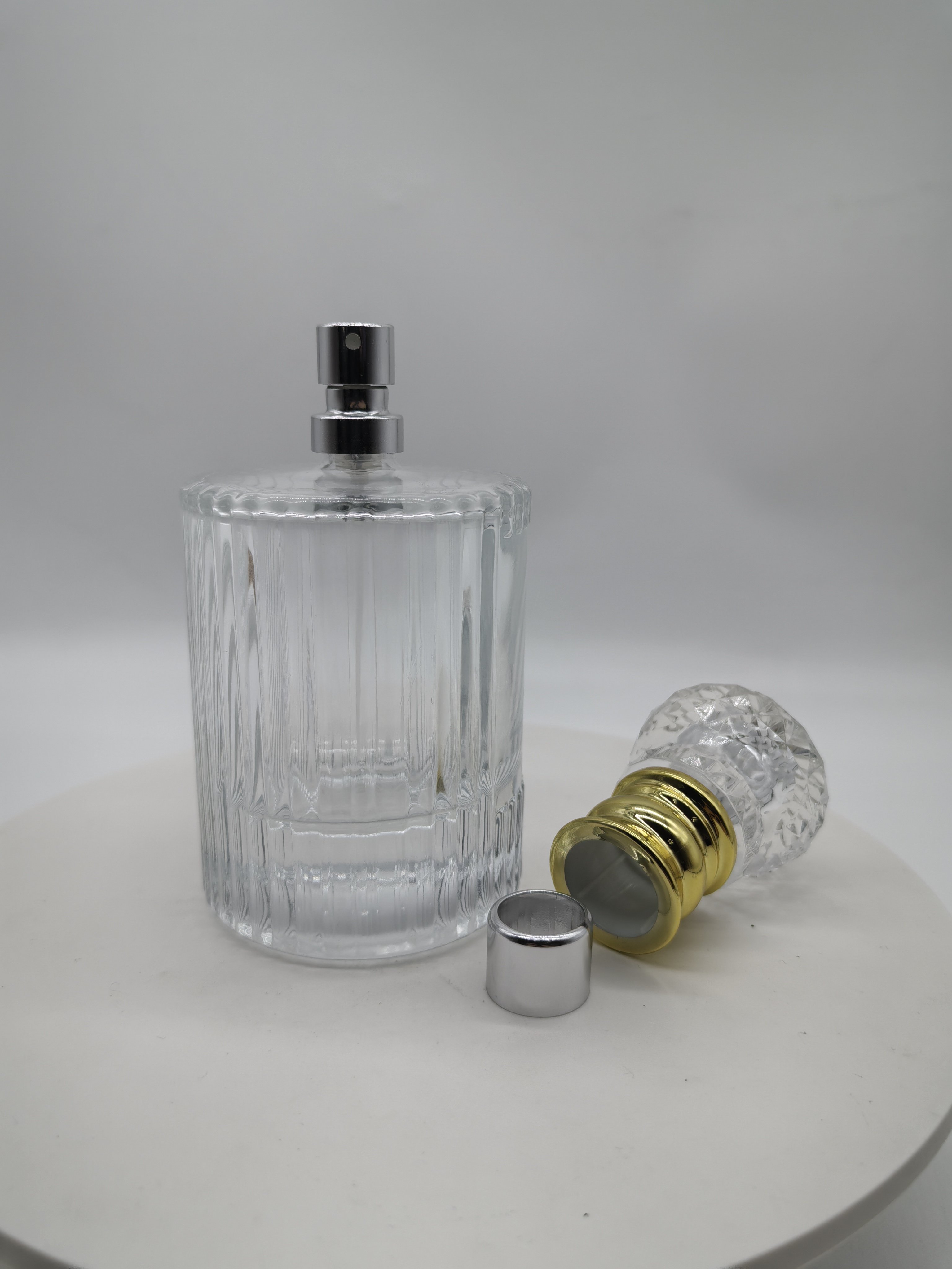 hot sale empty luxury 30ml 50ml 100ml FEA crimping pump clear fragrance all aluminum mist spray with cap perfume glass bottle
