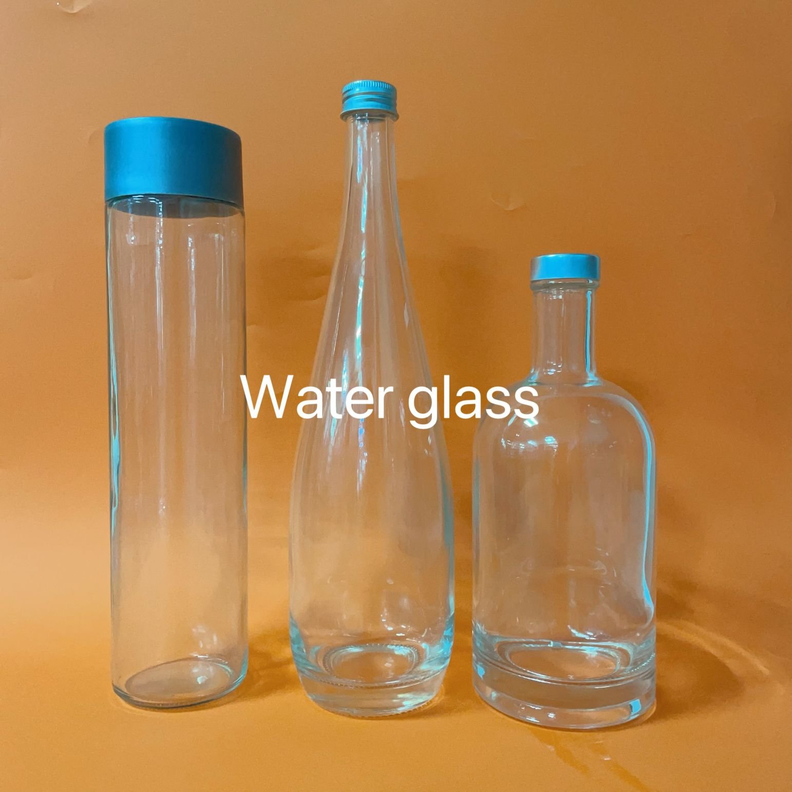 Luxury glass water bottles 330ml 500ml 750ml 1000ml 1L glass water bottles unique shape glass bottle with screw lid cap