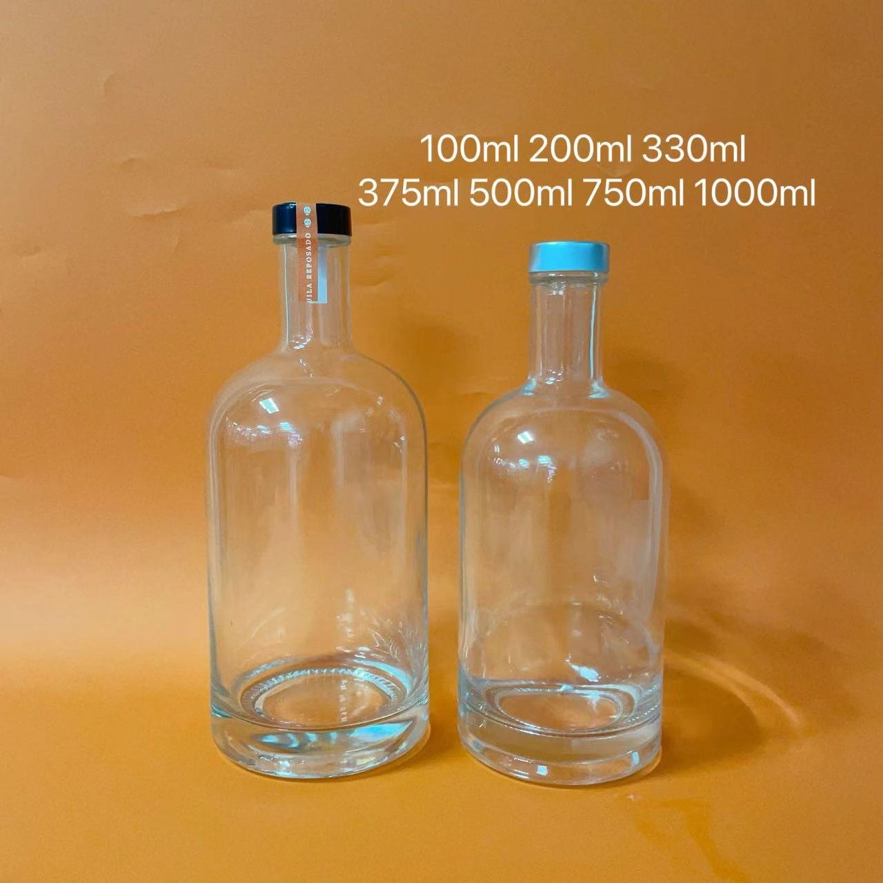 Luxury glass water bottles 330ml 500ml 750ml 1000ml 1L glass water bottles unique shape glass bottle with screw lid cap