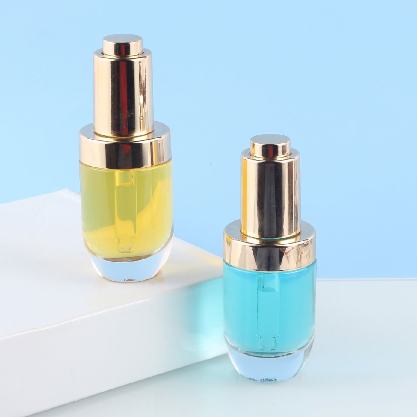 Low price thick walled press button transparent dropper bottle 1oz 30ml skincare serum glass bottle packaging