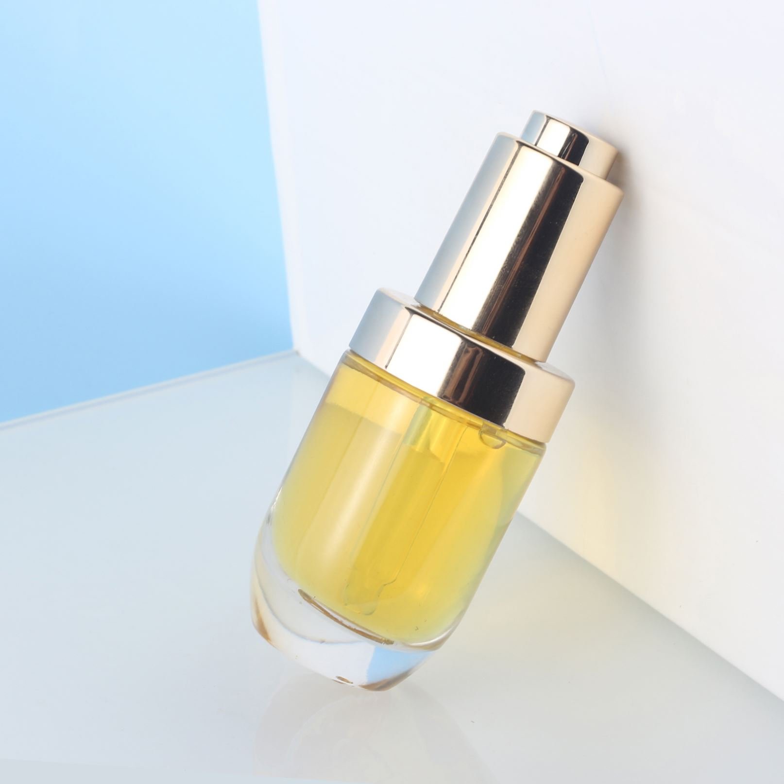 Low price thick walled press button transparent dropper bottle 1oz 30ml skincare serum glass bottle packaging