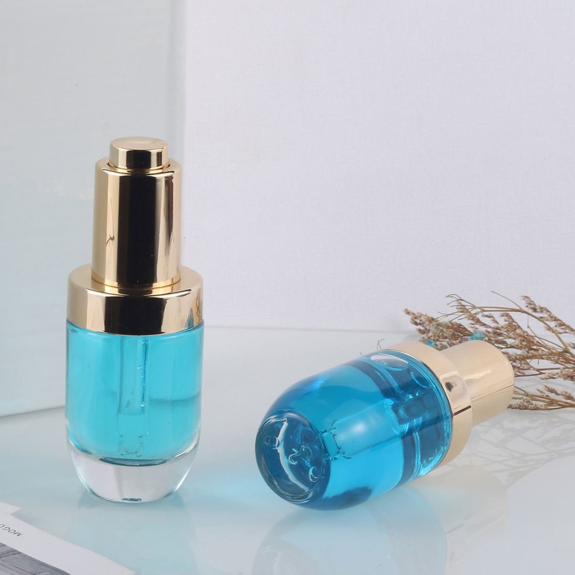 Low price thick walled press button transparent dropper bottle 1oz 30ml skincare serum glass bottle packaging