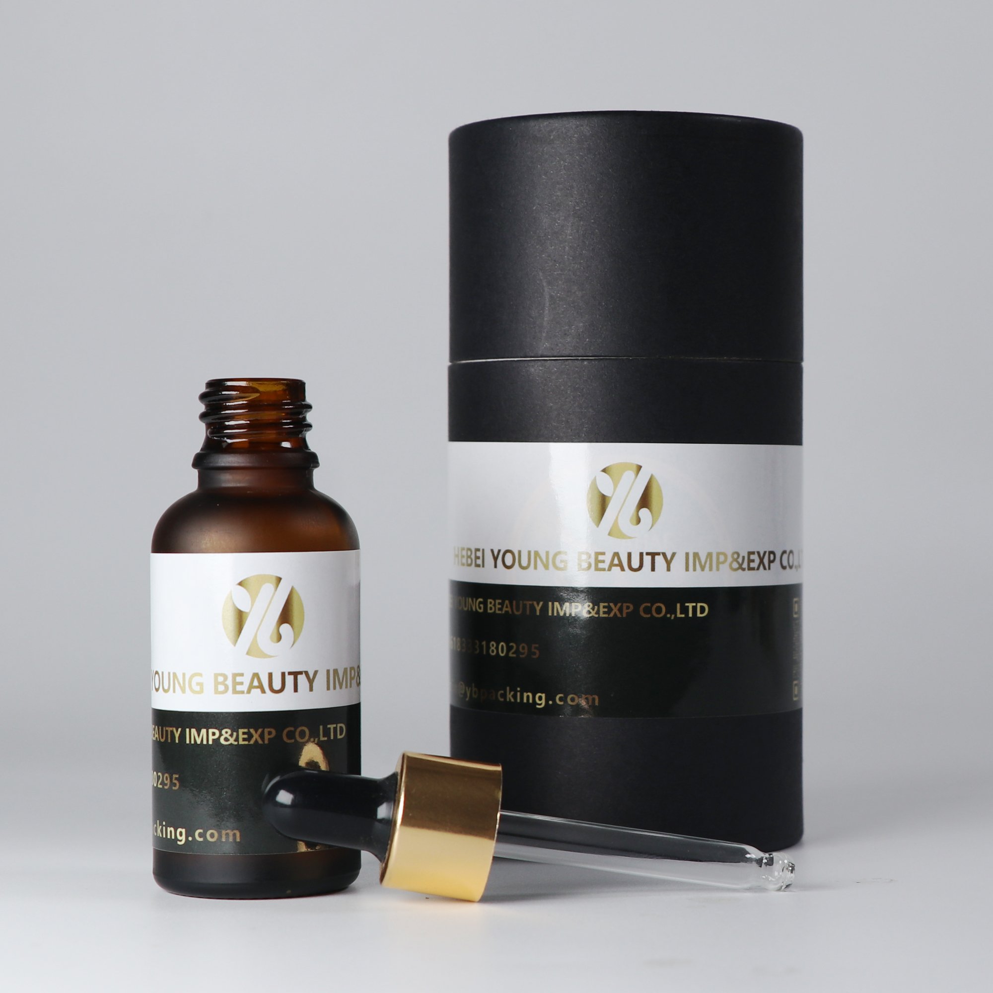 Customized Luxury 30ml black matte essential oil glass bottle with dropper label and printing glossy black lid flat shoulder