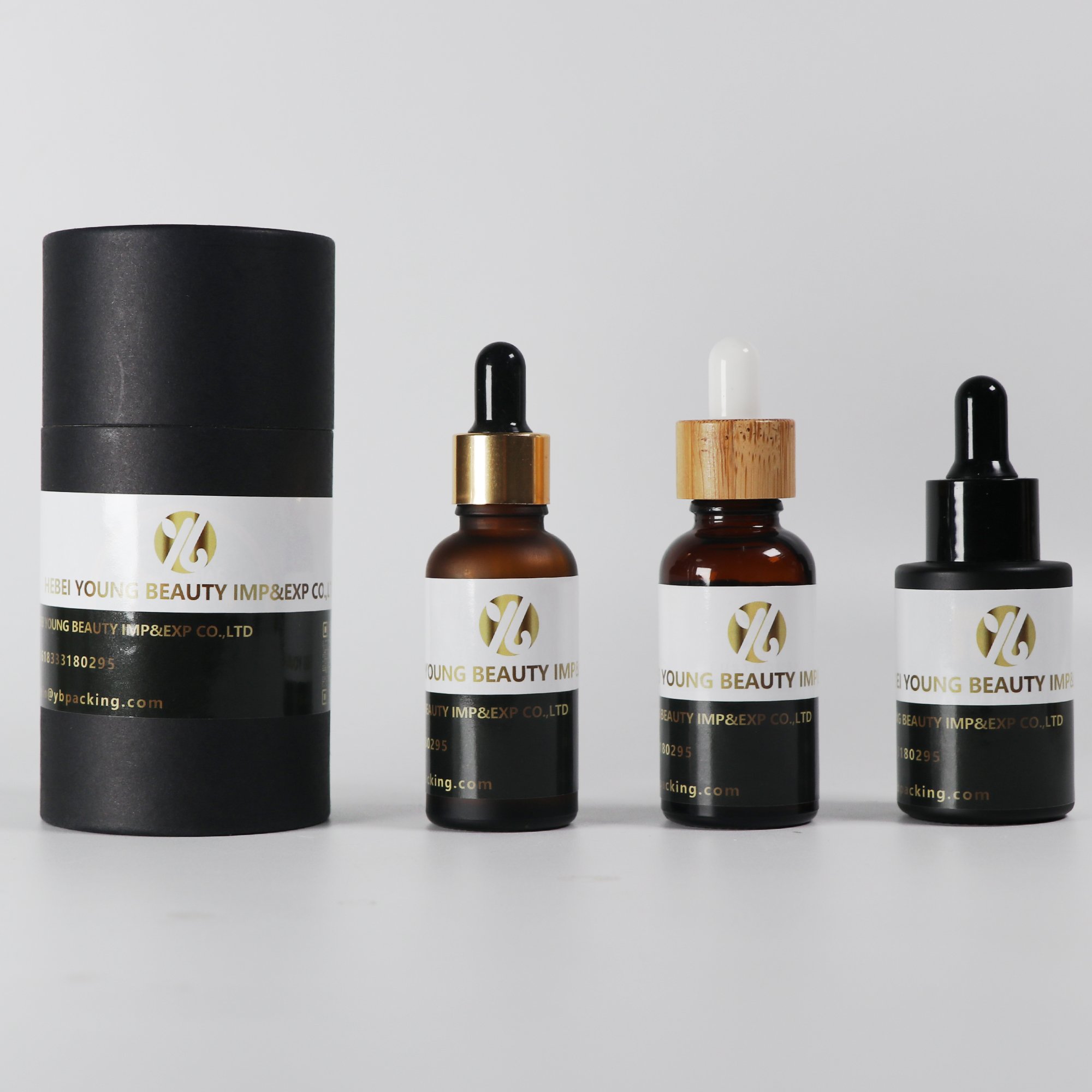 Customized Luxury 30ml black matte essential oil glass bottle with dropper label and printing glossy black lid flat shoulder