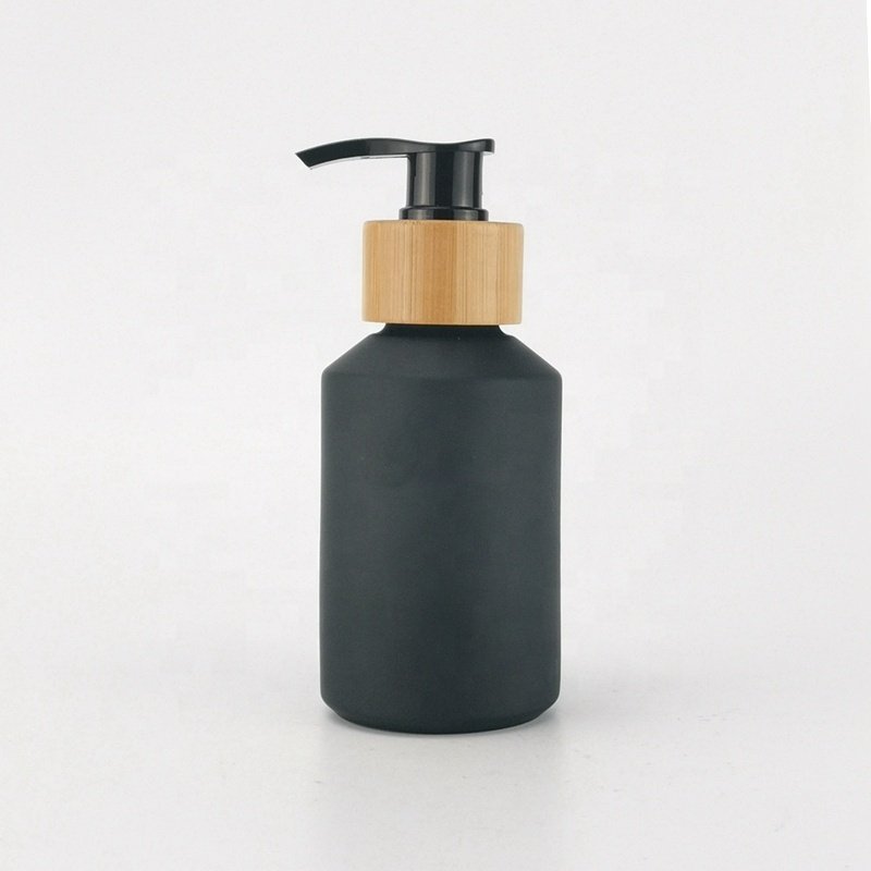 matte black glass bottle 125ml sloping shoulder serum glass bottle 4 oz cosmetic lotion bottle with bamboo pump for body milk
